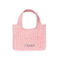 Pink textured handbag with 'Kosas' branding on a white background